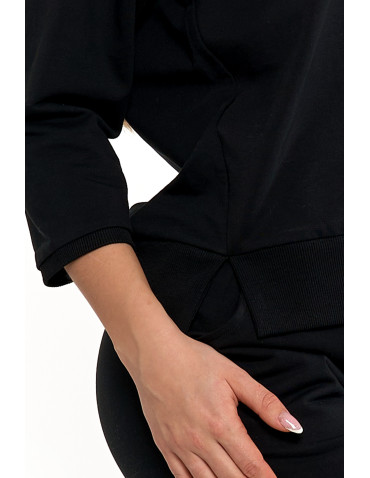 Bluzy - Bluza dresowa damska z rękawem 3/4 i rozcięciem po bokach CZARNY - produkt 4