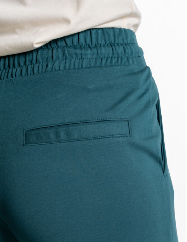 Spodnie - Damskie spodnie dresowe ze zwężaną nogawką ZIELONY - produkt 6