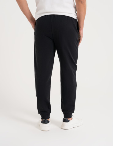 Spodnie dresowe - Spodnie męskie dresowe bawełniane z kieszeniami CZARNY - produkt 1