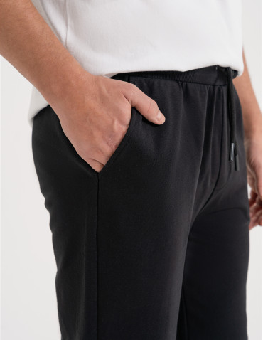 Spodnie dresowe - Spodnie męskie dresowe bawełniane z kieszeniami CZARNY - produkt 11