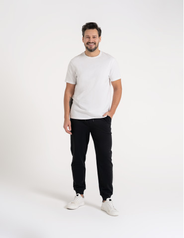 Spodnie dresowe - Spodnie męskie dresowe bawełniane z kieszeniami CZARNY - produkt 14