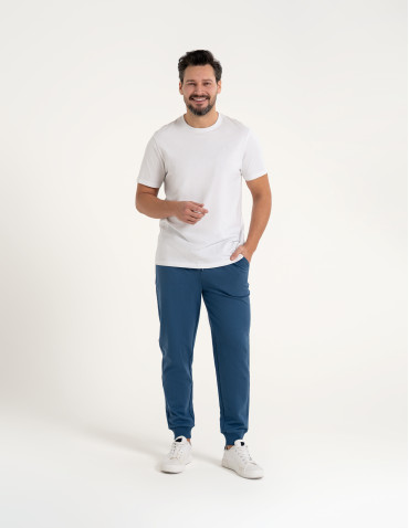 Spodnie dresowe - Spodnie męskie dresowe bawełniane z kieszeniami NIEBIESKI - produkt 8