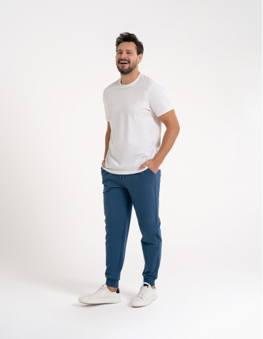 Spodnie dresowe - Spodnie męskie dresowe bawełniane z kieszeniami NIEBIESKI - produkt 10