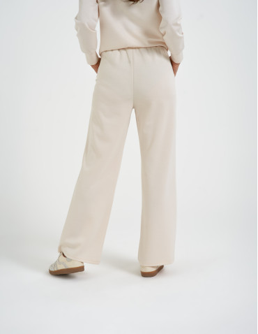 Spodnie dresowe - Spodnie dresowe damskie szerokie z kieszeniami KREMOWY - produkt 3