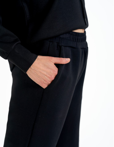 Spodnie dresowe - Spodnie dresowe damskie szerokie z kieszeniami CZARNY - produkt 4