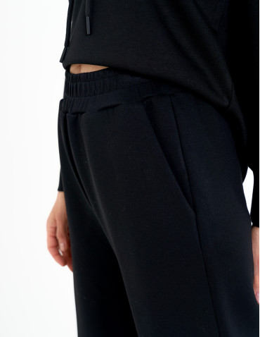 Spodnie dresowe - Spodnie dresowe damskie szerokie z kieszeniami CZARNY - produkt 5