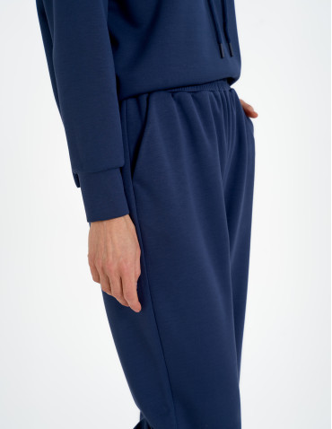 Spodnie dresowe - Spodnie dresowe damskie szerokie z kieszeniami NIEBIESKI - produkt 6