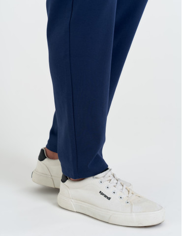 Spodnie dresowe - Męskie spodnie dresowe z prostą nogawką GRANATOWY - produkt 4