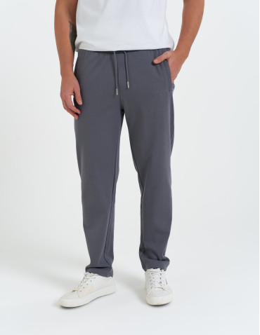 Spodnie dresowe - Męskie spodnie dresowe z prostą nogawką SZARY - produkt 5
