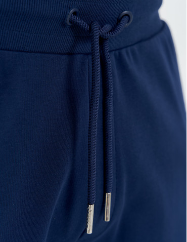 Spodnie dresowe - Męskie spodnie dresowe z prostą nogawką GRANATOWY - produkt 3