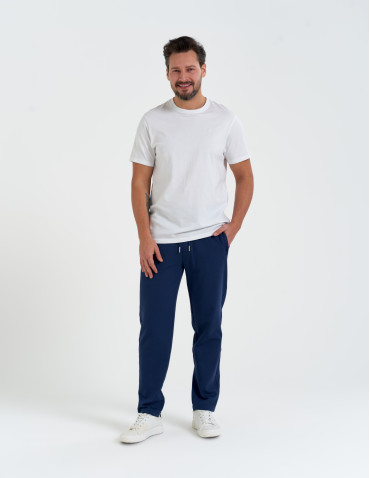 Spodnie dresowe - Męskie spodnie dresowe z prostą nogawką GRANATOWY - produkt 1