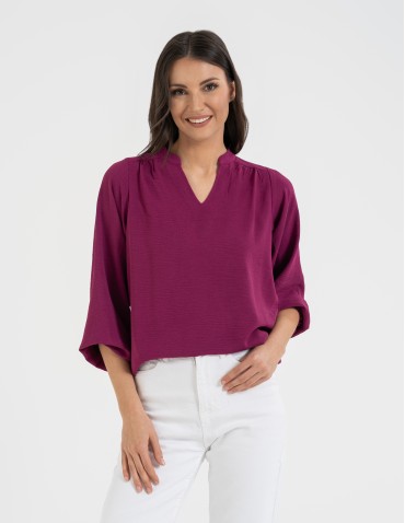 Damska bluzka z długimi szerokimi rękawami