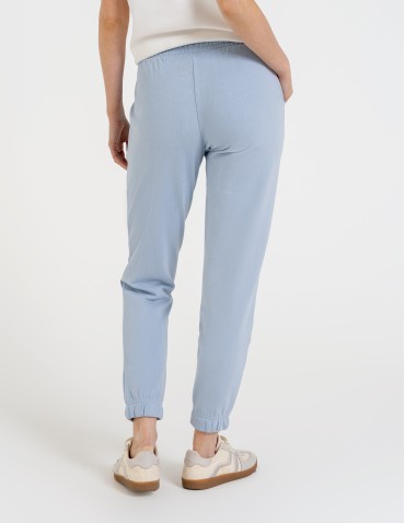Spodnie damskie - Spodnie dresowe damskie z kieszeniami i ściągaczami NIEBIESKI - produkt 7