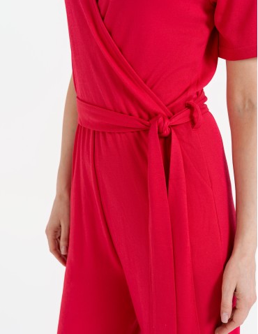 Kombinezony - Kombinezon damski z kopertowym dekoltem i paskiem FUKSJA - produkt 4