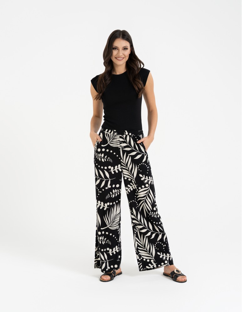 Spodnie materiałowe - Spodnie damskie wiskozowe 100% z roślinnym wzorem CZARNY - produkt moraj.pl 1