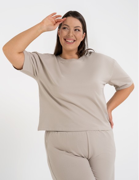 T-shirt damski o luźnym...