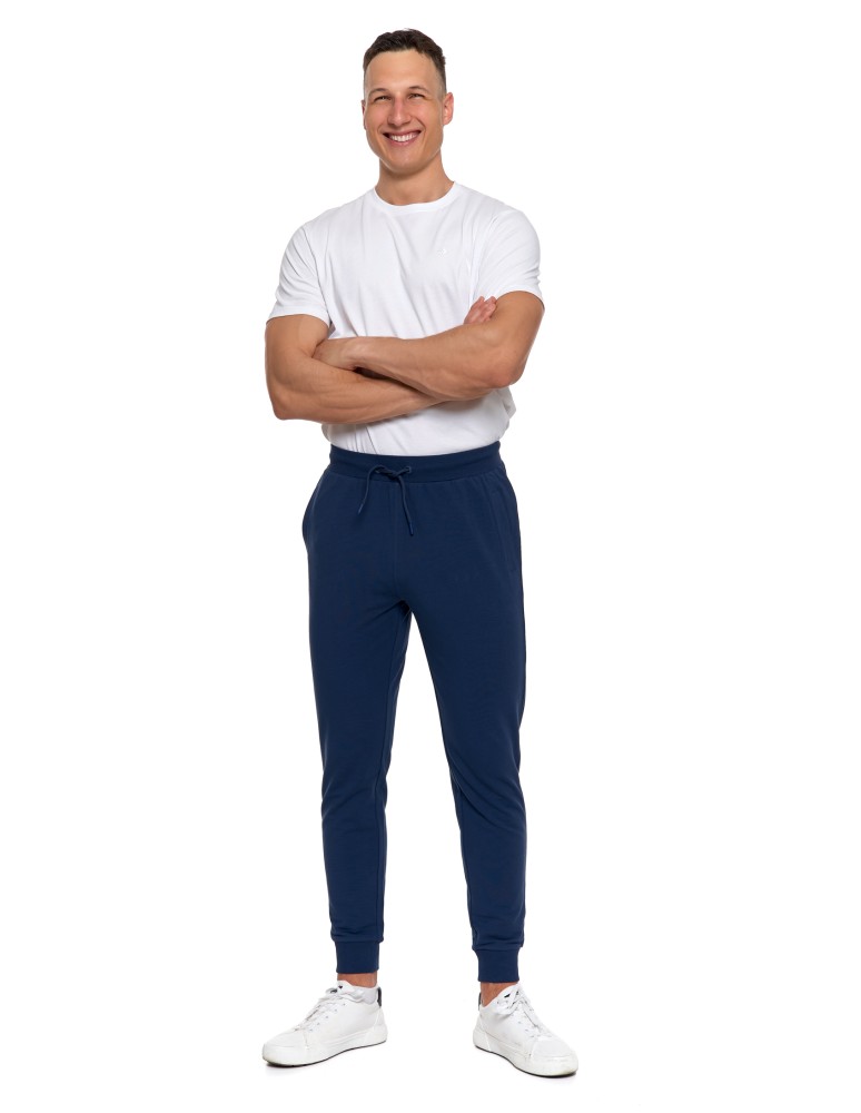 Spodnie męskie - Męskie spodnie dresowe z kieszeniami i ściągaczem GRANATOWY - produkt moraj.pl 1