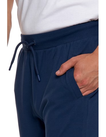 Spodnie męskie - Męskie spodnie dresowe z kieszeniami i ściągaczem GRANATOWY - produkt 7