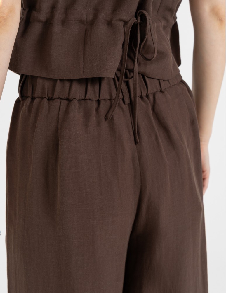 Spodnie materiałowe - Spodnie damskie z szeroką nogawką typu wide leg z lyocellu CIEMNY BRĄZ  - produkt moraj.pl 4