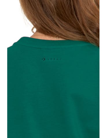 Bluzy damskie - Bluza dresowa damska z rękawem 3/4 i rozcięciem po bokach ZIELONY - produkt 5