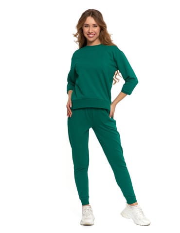Bluzy damskie - Bluza dresowa damska z rękawem 3/4 i rozcięciem po bokach ZIELONY - produkt 10