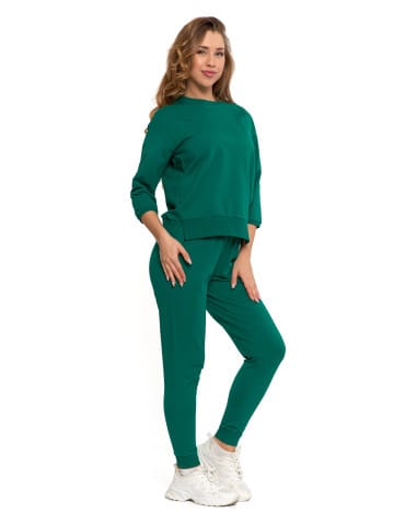 Bluzy damskie - Bluza dresowa damska z rękawem 3/4 i rozcięciem po bokach ZIELONY - produkt 12