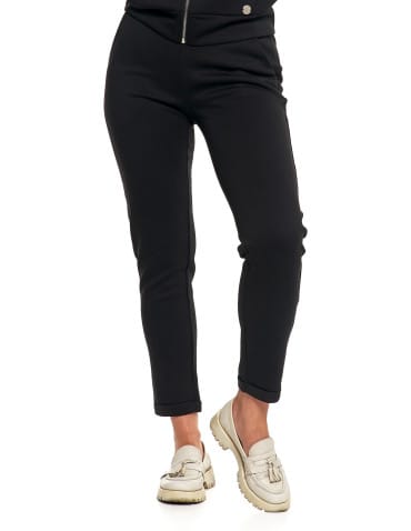 Spodnie damskie - Damskie spodnie dresowe rurki eleganckie z kieszeniami CZARNY - produkt 3