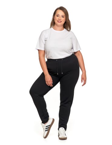 Spodnie damskie - Damskie spodnie dresowe rurki eleganckie z kieszeniami CZARNY - produkt 4