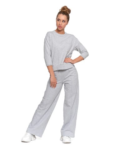 Bluzy damskie - Bluza damska z kieszonką o luźnym kroju SZARY - produkt 9
