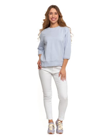 Bluzy damskie - Bluza dresowa damska z rękawem 3/4 i rozcięciem po bokach JASNY NIEBIESKI  - produkt 7