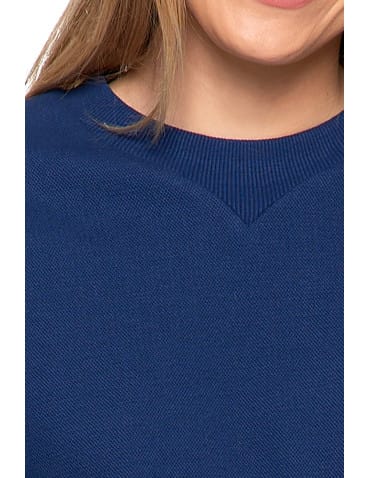 Bluzy damskie - Damska bluza dresowa ocieplana bez kaptura GRANATOWY - produkt 3