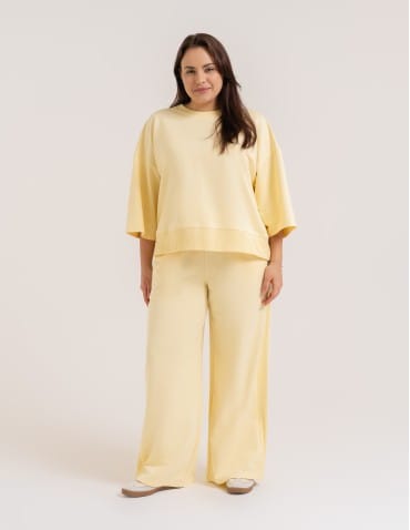Bluzy dresowe - Bluza dresowa damska o luźnym kroju bez kaptura ŻÓŁTY - produkt 12
