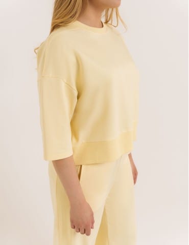Bluzy dresowe - Bluza dresowa damska o luźnym kroju bez kaptura ŻÓŁTY - produkt 5