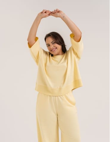 Bluzy dresowe - Bluza dresowa damska o luźnym kroju bez kaptura ŻÓŁTY - produkt 11