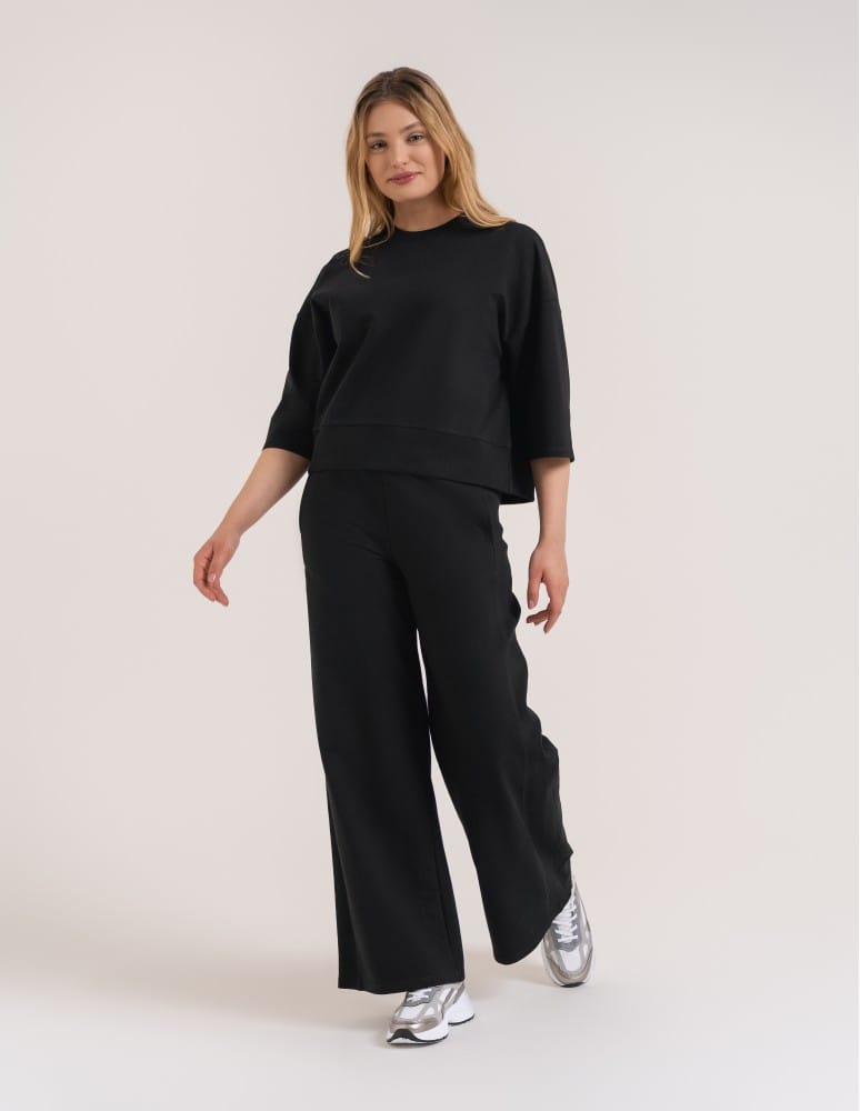 Bluza dresowa damska o luźnym kroju bez kaptura CZARNY